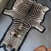 Beautiful zebra skin finished with thick felt.