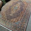 Hand-knotted vintage woolen Bidjar Persian carpet.