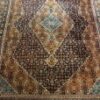 Hand-knotted vintage woolen Bidjar Persian carpet.