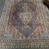Hand-knotted vintage woolen Bidjar Persian carpet.