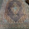 Hand-knotted vintage woolen Bidjar Persian carpet.