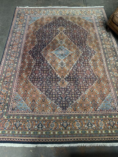 Hand-knotted vintage woolen Bidjar Persian carpet.