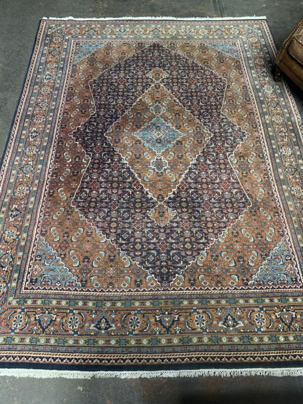 Hand-knotted vintage woolen Bidjar Persian carpet.