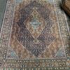 Hand-knotted vintage woolen Bidjar Persian carpet.