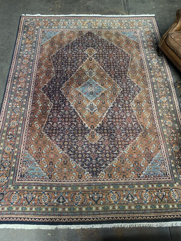 Hand-knotted vintage woolen Bidjar Persian carpet.