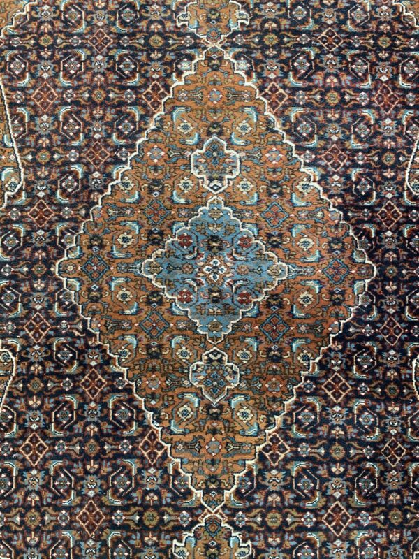 Hand-knotted vintage woolen Bidjar Persian carpet.