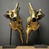 Set giraffe schedels verbronst.