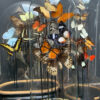 Antique dome filled with a mix of colourful butterflies (autumn shades)