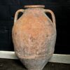 Oude terracotta kruik