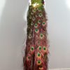 Stuffed peacock mounted on a pedestal. Fresh taxidermy.