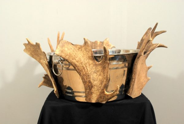 Champagne cooler made from deer antlers. Wine cooler