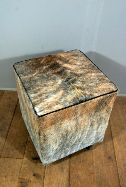 Pouf made of cowhide.