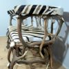 Unique bench made from deer antlers and zebraskin.