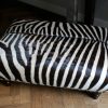 Very nice and unique zebra ottoman.