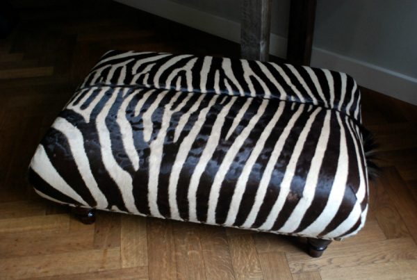 Very nice and unique zebra ottoman.