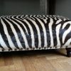 Very nice and unique zebra ottoman.