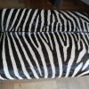 Very nice and unique zebra ottoman.