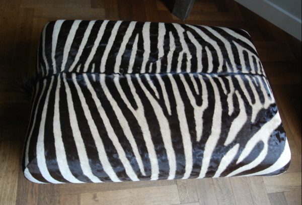 Very nice and unique zebra ottoman.