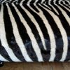 Very nice and unique zebra ottoman.