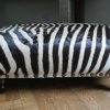 Unique bench made from deer antlers and zebraskin.