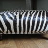 Very nice and unique zebra ottoman.