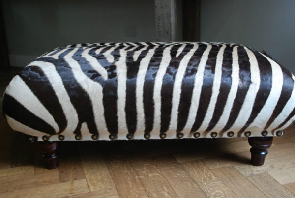 Very nice and unique zebra ottoman.