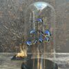 Modern bell jar filled with butterflies