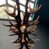 Oblong hanging lamp made of red deer antlers