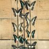 Antieke ovale stolp met vlinders (Papilio Ulysses Ulysses en Morpho Didius)