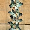 Decoratieve antieke stolp met vlinders