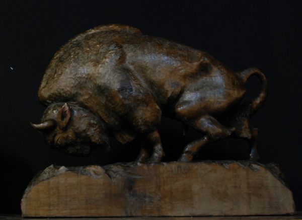 Antique hand carved bison