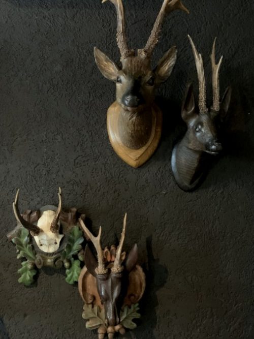 Unique set of 3 antique wooden and plaster deer heads.