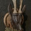 Unique set of 3 antique wooden and plaster deer heads.