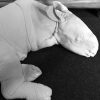 Lifelike replica of a rhinoceros calf