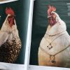 Opgezette kippen van de Jachtkamer in de krant
