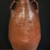 Antieke rode terracotta kruik