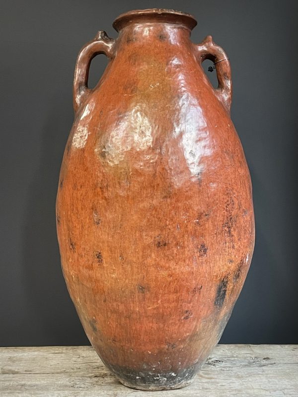 Antieke rode terracotta kruik