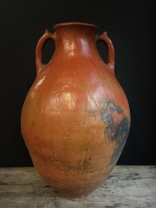 Antieke rode terracotta kruik