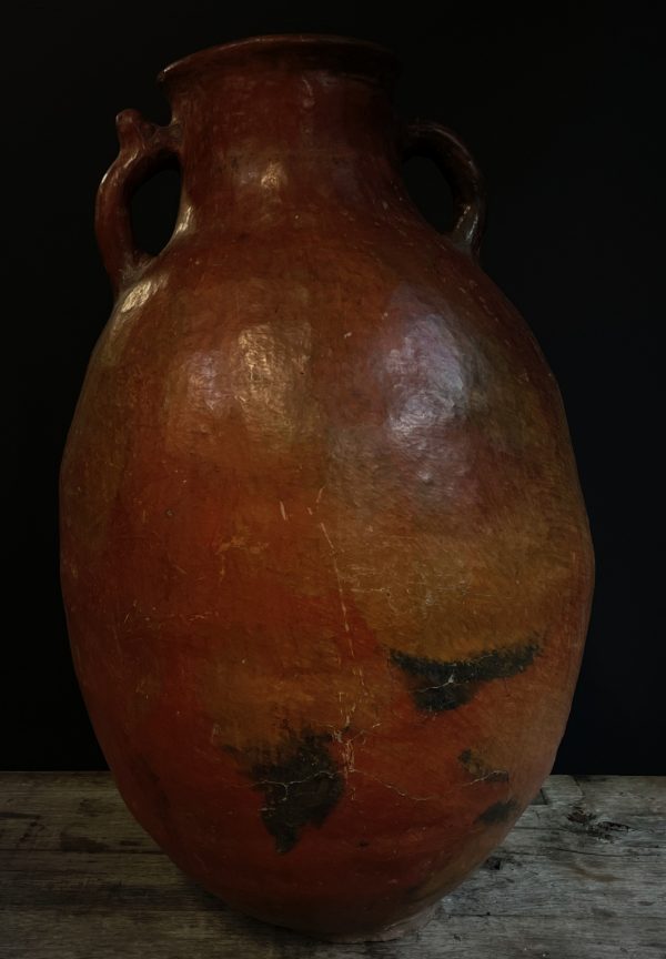 Antieke rode terracotta kruik