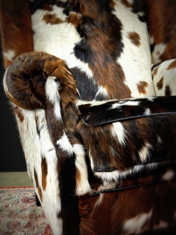 Robuuste Fauteuil in koeienhuid