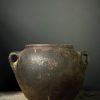 Antiek zwart terracotta kruikje