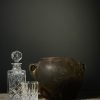 Antiek zwart terracotta kruikje