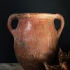 Antieke oker rode terracotta kruik