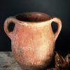 Antieke oker rode terracotta kruik