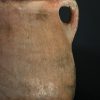 Antieke oker rode terracotta kruik Antieke oker rode terracotta kruik