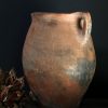 Antieke oker rode terracotta kruik Antieke oker rode terracotta kruik