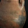 Antieke oker rode terracotta kruik Antieke oker rode terracotta kruik