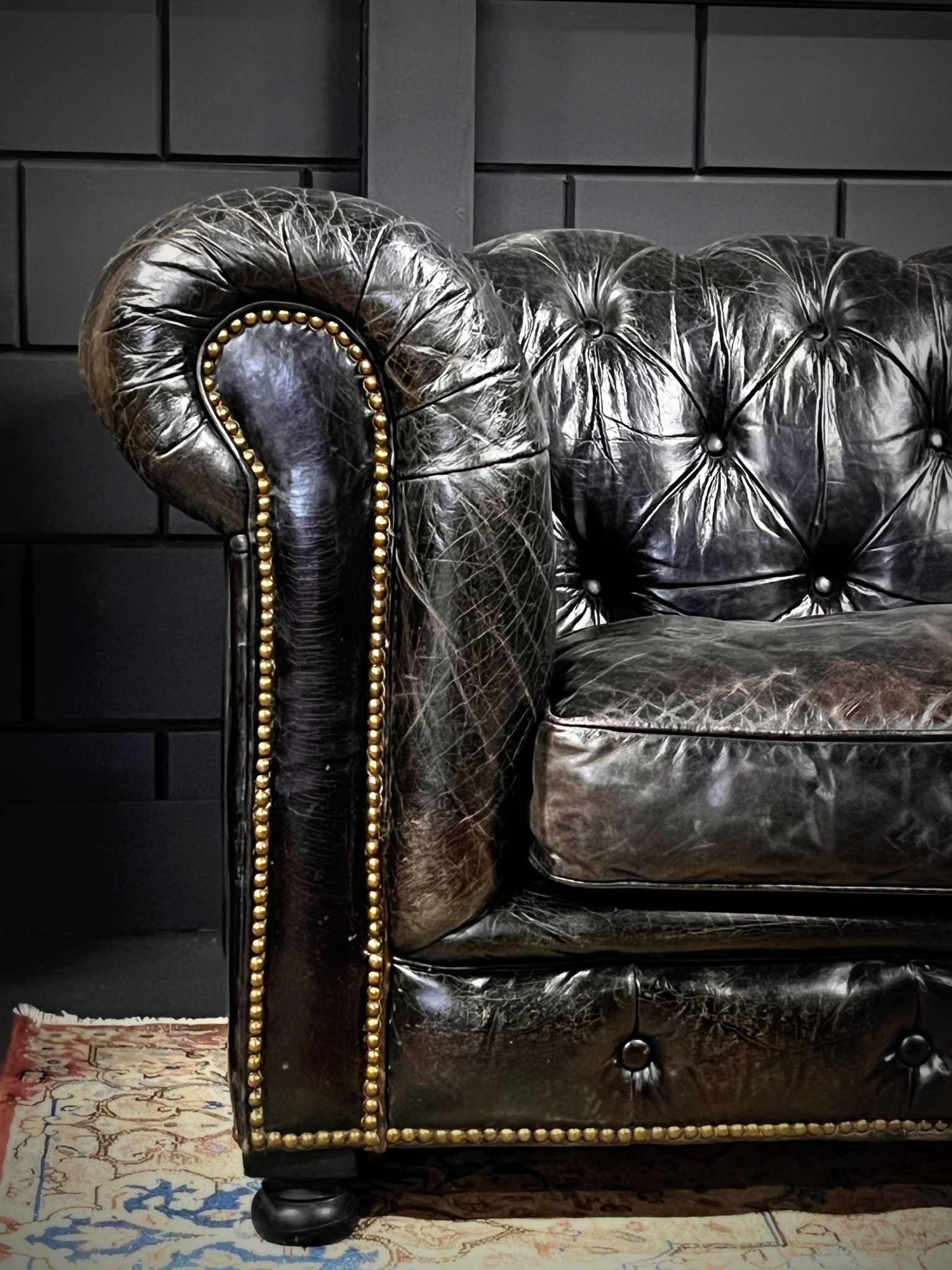 Vintage black leather Chesterfield sofa BEAST Interiors