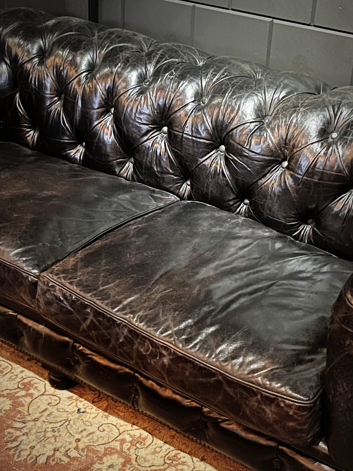 Vintage black leather Chesterfield sofa BEAST Interiors