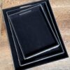 Satz Tabletts aus Rindsleder Satz Tabletts aus Rindsleder